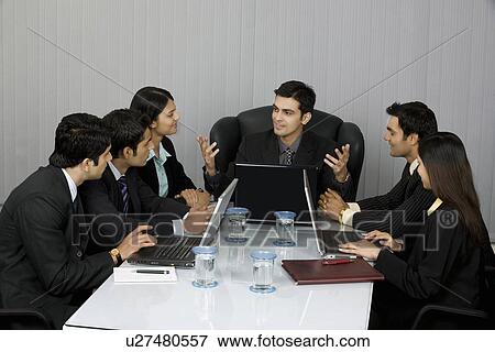 Stock Photo - Executives in a meeting . Fotosearch