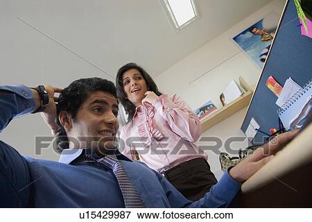 Executives in the office View Large Photo Image Stock Photo - Executives in the office. Fotosearch