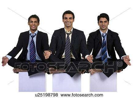 Stock Photo - Executives meditating. Fotosearch