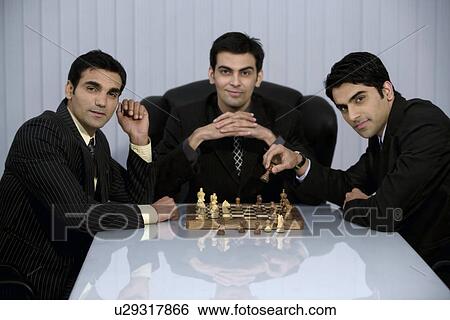Executives playing chess View Large Photo Image Stock Photograph - Executives playing chess. Fotosearch