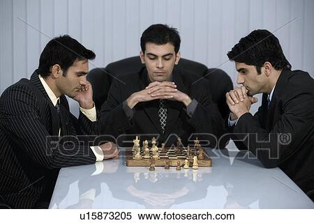 Executives playing chess View Large Photo Image Stock Photography - Executives playing chess. Fotosearch
