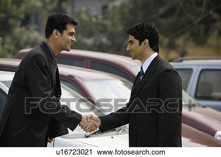 Executives sealing the deal View Large Photo Image Stock Image - Executives sealing the deal. Fotosearch