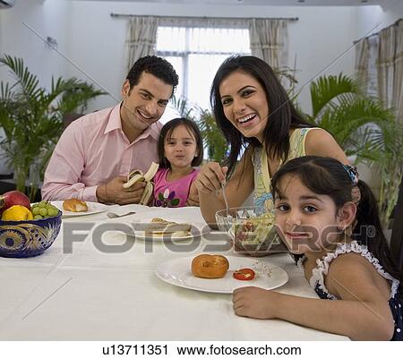 Family at the breakfast table View Large Photo Image Stock Image - Family at the breakfast table. Fotosearch