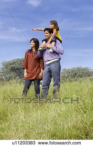 Stock Image - Family at the park. Fotosearch