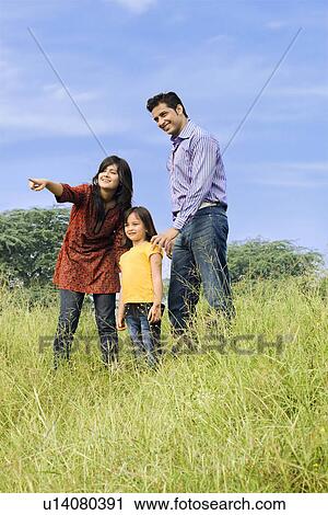 Stock Image - Family at the park. Fotosearch