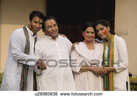 Family celebrating Holi View Large Photo Image Stock Photo - Family celebrating Holi. Fotosearch