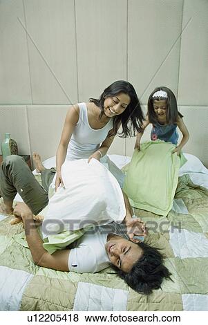 Family having fun View Large Photo Image Stock Photo - Family having fun. Fotosearch