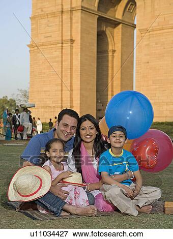 Family on a picnic View Large Photo Image Stock Photo - Family on a picnic. Fotosearch