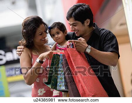 Stock Image - Family shopping. Fotosearch