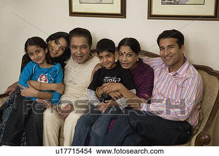Family sitting together View Large Photo Image Picture - Family sitting together. Fotosearch