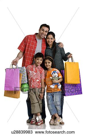 Family with shopping bags View Large Photo Image Stock Image - Family with shopping bags. Fotosearch