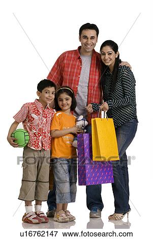 Stock Photo - Family with shopping bags. Fotosearch