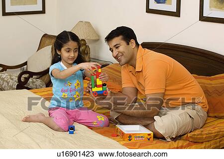 Father and daughter having fun View Large Photo Image Stock Image - Father and daughter having fun. Fotosearch