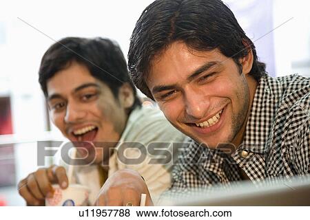 Friends at a food stall View Large Photo Image Stock Photo - Friends at a food stall. Fotosearch