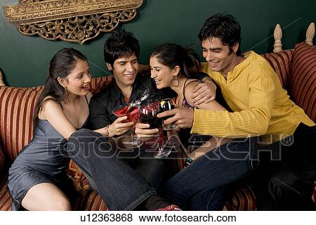 Friends Enjoying Their Drink View Large Photo Image Stock Photo - Friends Enjoying Their Drink. Fotosearch
