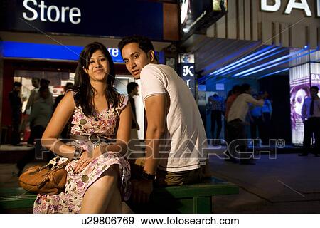 Friends posing at a market place View Large Photo Image Stock Photo - Friends posing at a market place. Fotosearch