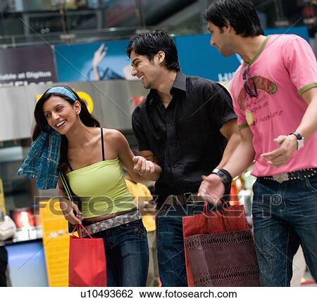 Stock Image - Friends shopping. Fotosearch