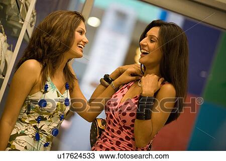 Stock Image - Friends shopping. Fotosearch