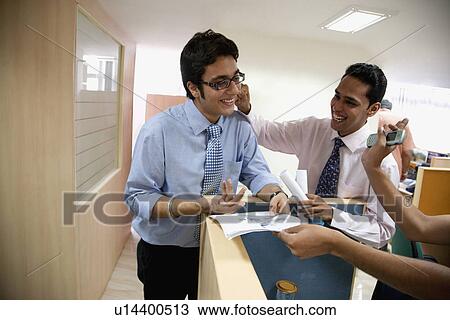Stock Image - Fun at office. Fotosearch