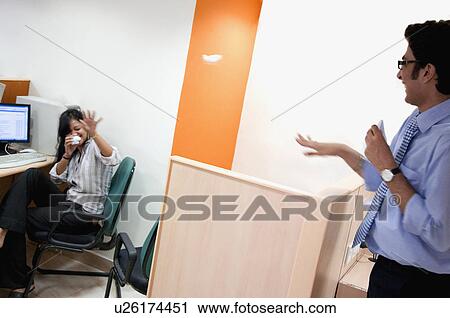 Stock Image - Fun at the office. Fotosearch