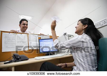 Stock Photograph - Fun at the office. Fotosearch