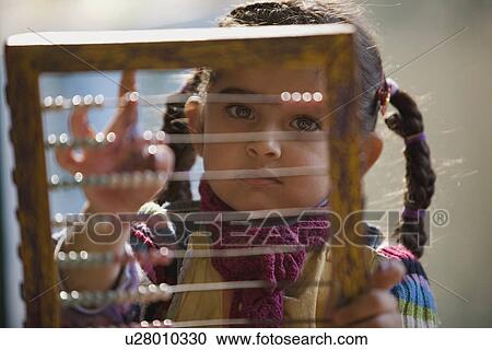Girl with an abacus View Large Photo Image Stock Image - Girl with an abacus. Fotosearch