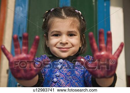 Girl with paint on her hands View Large Photo Image Stock Image - Girl with paint on her hands. Fotosearch