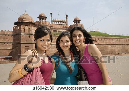 Stock Image - Girls in front of the Red Fort. Fotosearch
