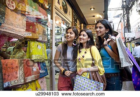 Girls window shopping View Large Photo Image Stock Image - Girls window shopping. Fotosearch