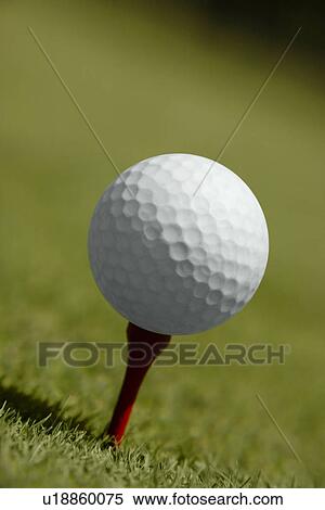 Golf ball on tee View Large Photo Image Stock Photography - Golf ball on tee. Fotosearch