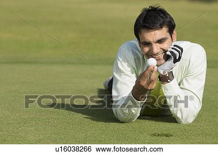 Golfer smiling View Large Photo Image Stock Photograph - Golfer smiling. Fotosearch