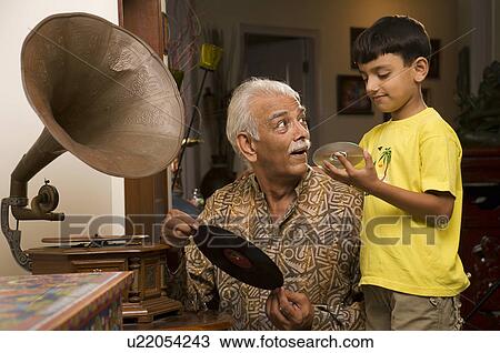 Stock Image - Grandfather and grandson. Fotosearch