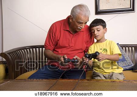 Stock Photograph - Grandfather and grandson. Fotosearch