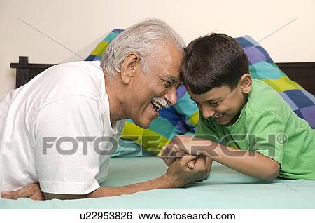Stock Photograph - Grandfather and grandson. Fotosearch