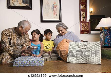 Grandparents and grandchildren View Large Photo Image Stock Photography - Grandparents and grandchildren. Fotosearch