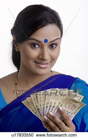 Holding some money View Large Photo Image Stock Image - Holding some money. Fotosearch