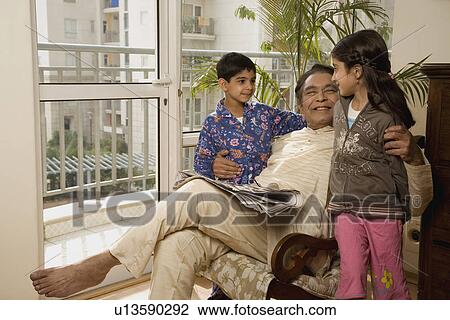 Kids with their grandfather View Large Photo Image Stock Image - Kids with their grandfather. Fotosearch