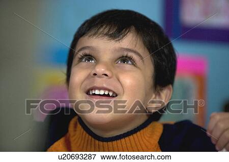 Little boy smiling View Large Photo Image Stock Photo - Little boy smiling. Fotosearch