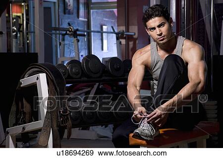 Man at the gym View Large Photo Image Stock Photo - Man at the gym. Fotosearch