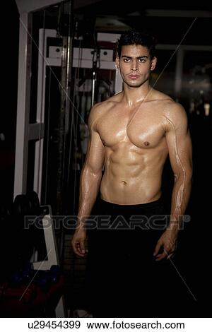 Stock Photo - Man at the gym. Fotosearch