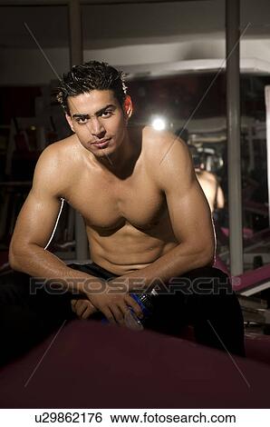 Stock Photograph - Man at the gym. Fotosearch