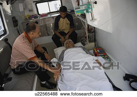 Stock Photo - Man comforting his unwell wife. Fotosearch