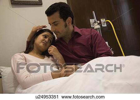 Man consoling his wife View Large Photo Image Stock Image - Man consoling his wife. Fotosearch