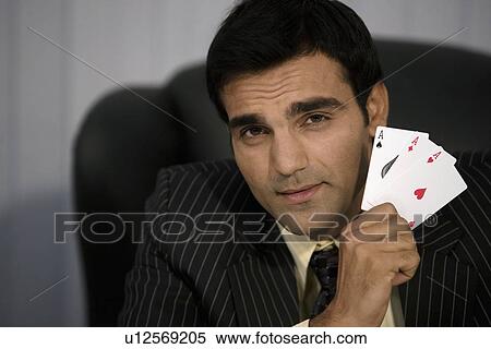 Man holding three aces View Large Photo Image Stock Photography - Man holding three aces. Fotosearch