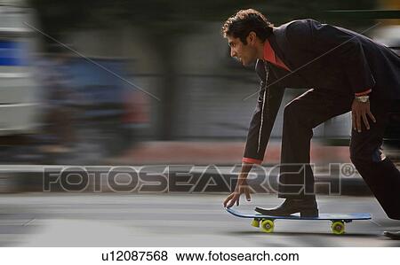 Man on a skateboard View Large Photo Image Stock Photo - Man on a skateboard. Fotosearch