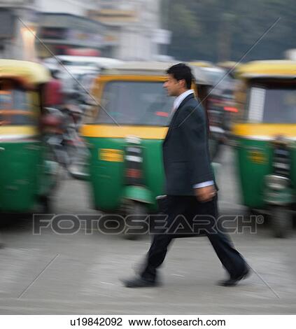 Stock Image - Man on the road. Fotosearch