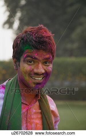 Stock Photo - Man playing Holi. Fotosearch