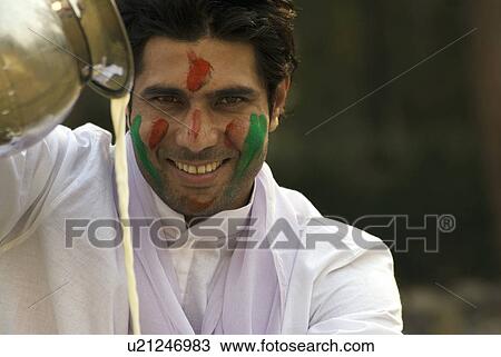 Man pouring Bhang View Large Photo Image Stock Image - Man pouring Bhang. Fotosearch