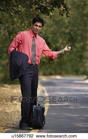Man seeking lift View Large Photo Image Stock Image - Man seeking lift. Fotosearch