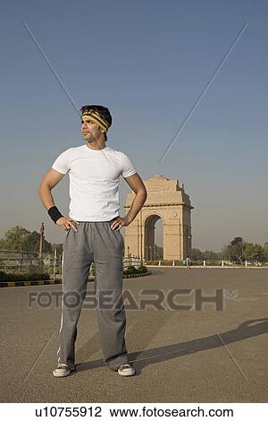 Man standing in front of the India Gate View Large Photo Image Stock Image - Man standing in front of the India Gate. Fotosearch